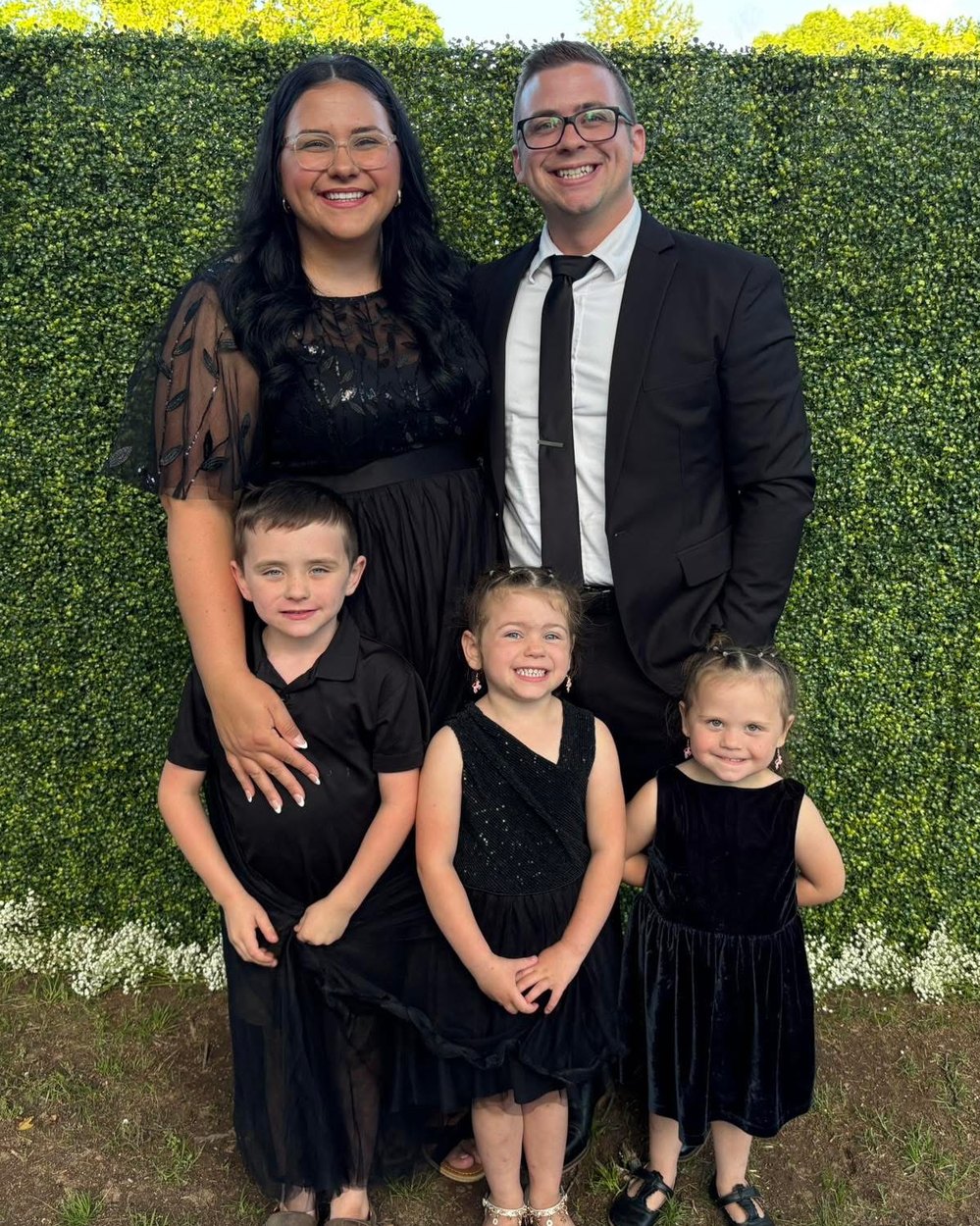 Aaron Tipton with his wife and three children